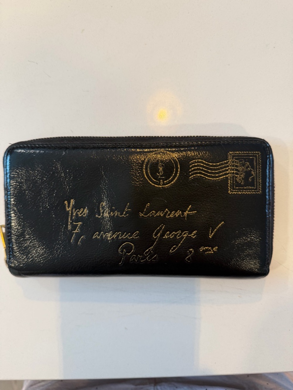 Yves Saint Laurent Black Leather Zip Wallet with Gold Script Motif